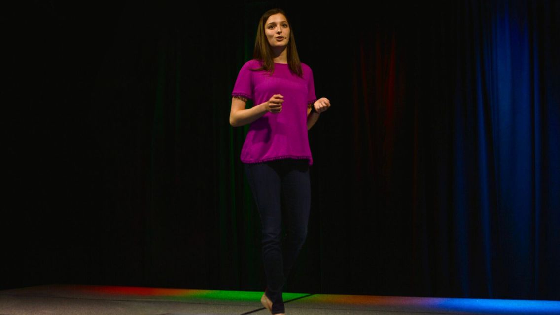 Sarah Handler Speaking on Stage for Microsoft